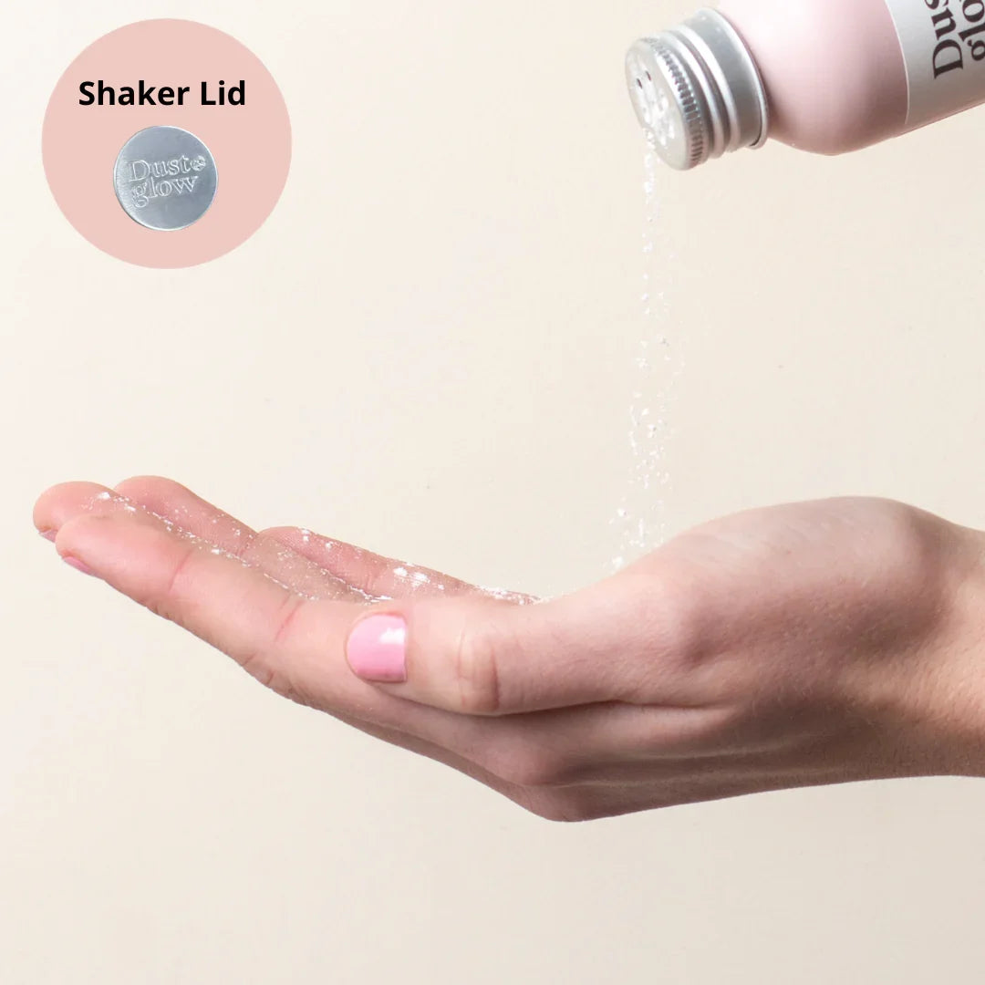 Shaker lid dispensing fine powder into hand, eco-friendly waterless beauty product